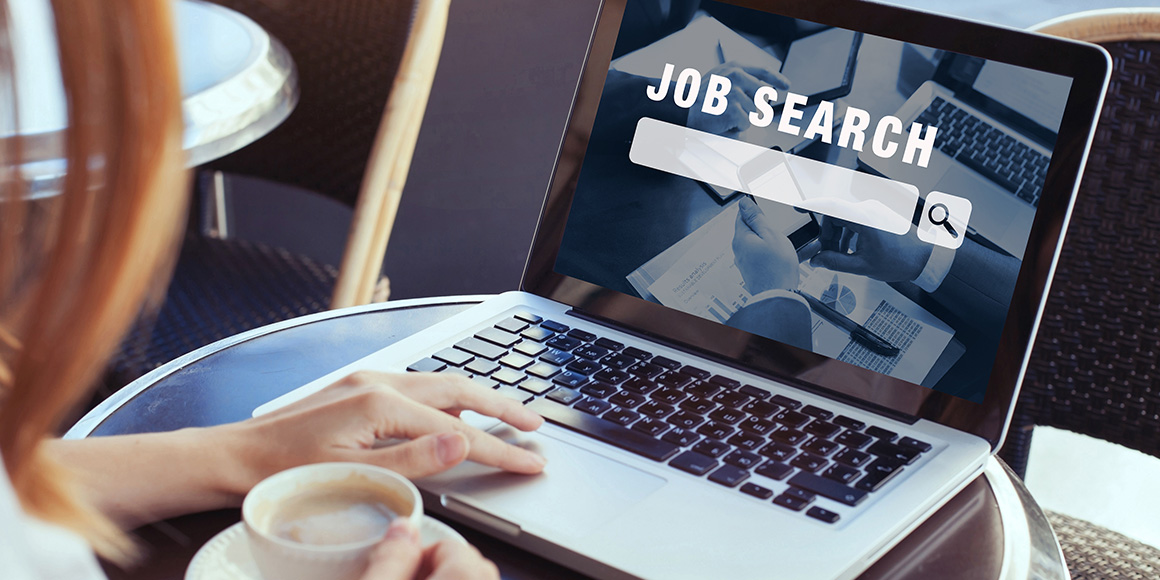 Woman searching a job-matching platform on a computer. 