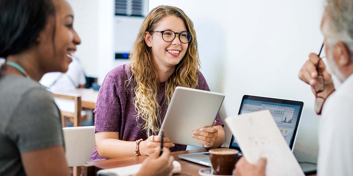 A teacher discusses with two students how to highlight their skills versus their attributes for their career search. 