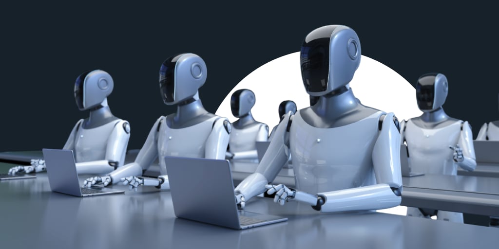 A group of AI robots sitting at desk working on computers