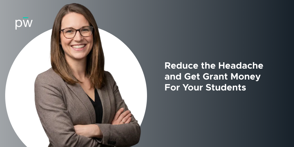 Woman with glasses and her arms crossed, smiling