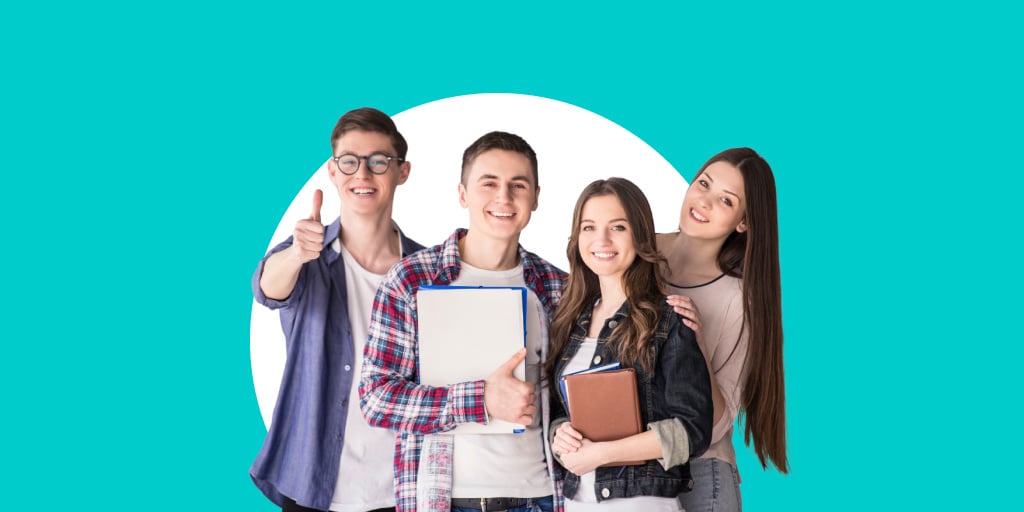 A group of young teens with folders and books smiling, giving thumbs up