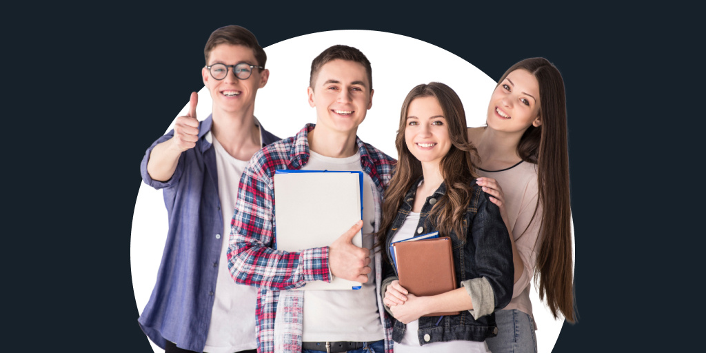 Several young adults standing together with notebooks and smiling