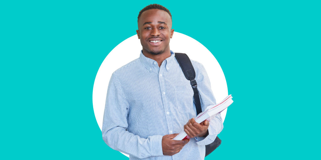 A young man wearing a backpack carrying a piece of paper, as he smiles