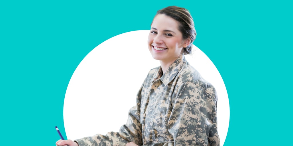 A soldier sitting down and smiling