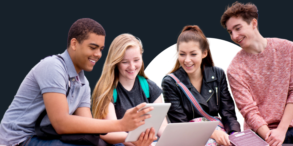 A group of young adults wearing backpacks and all looking at a tablet and computer together as they work