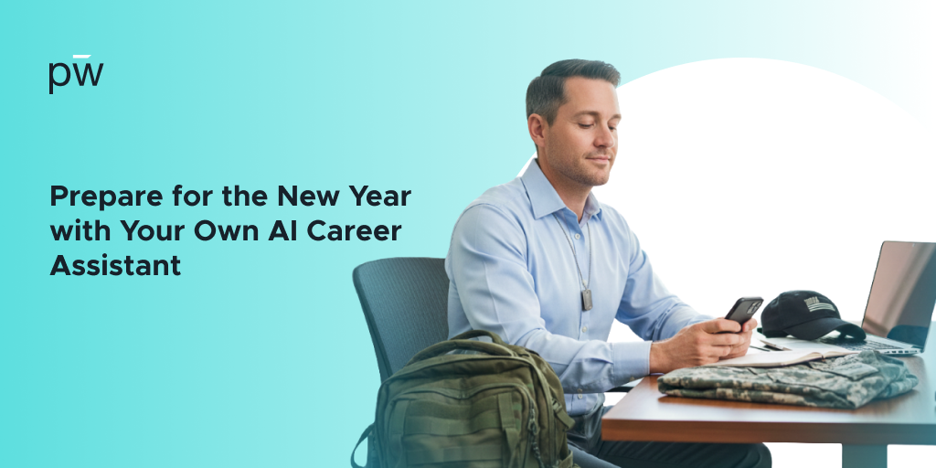 A man seated in a chair, working on his laptop and phone
