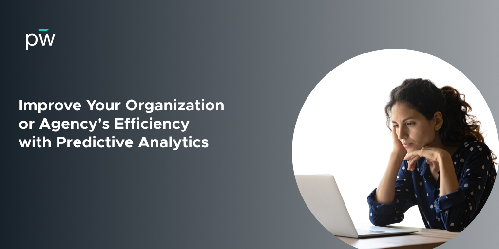 Woman leaning over while working on a laptop