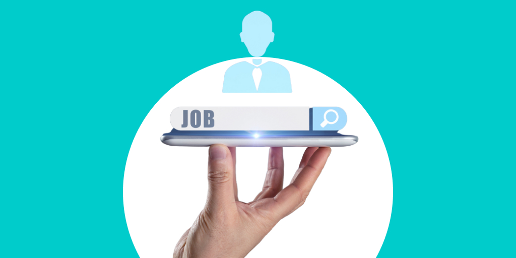 A person's hand holding up a digital/holographic display with a worker in the center, and 