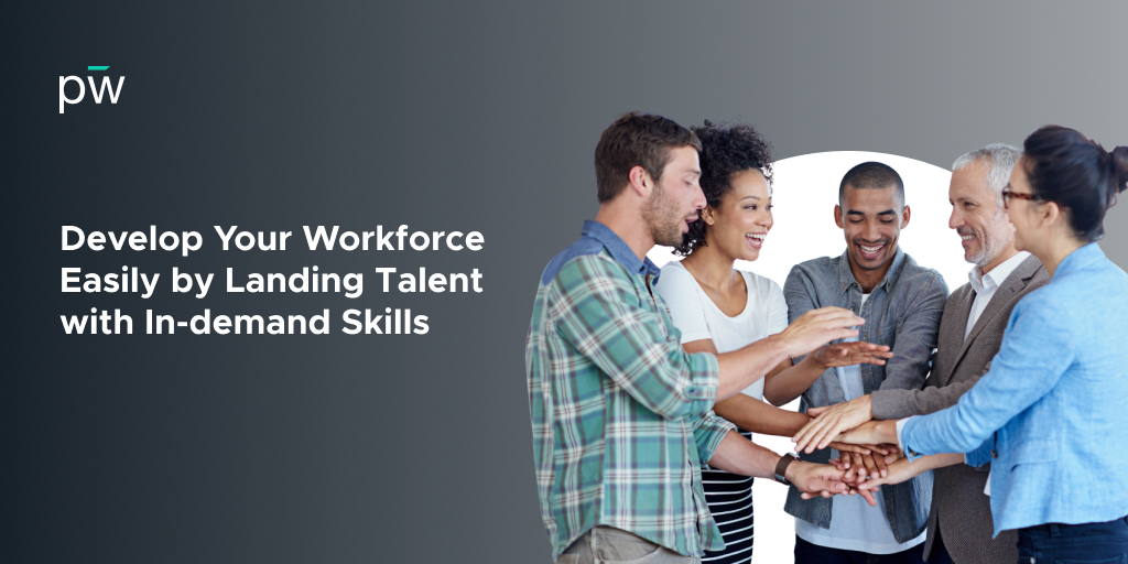 Group of people all with hands in the middle of the